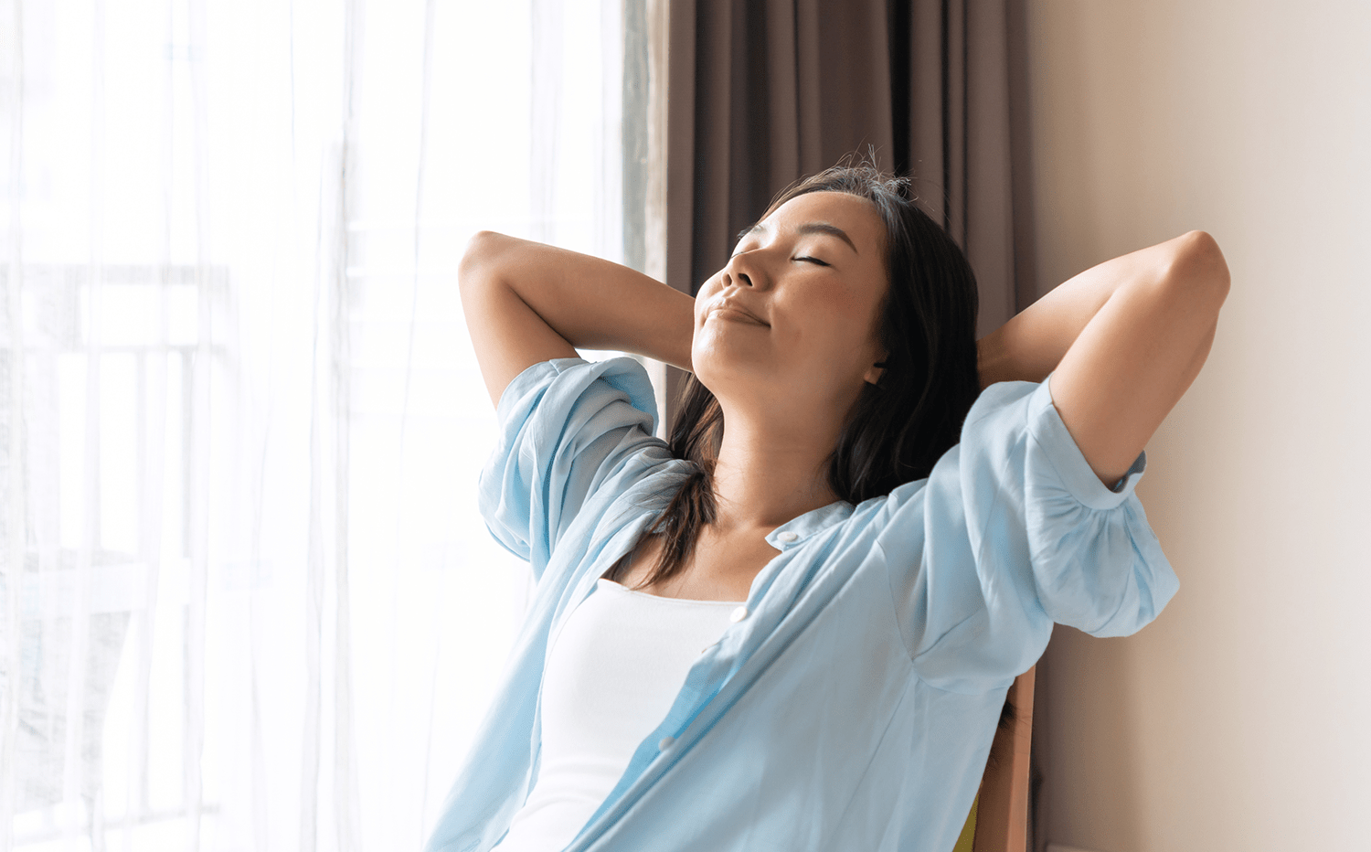 Woman inside loving her comfortable AC
